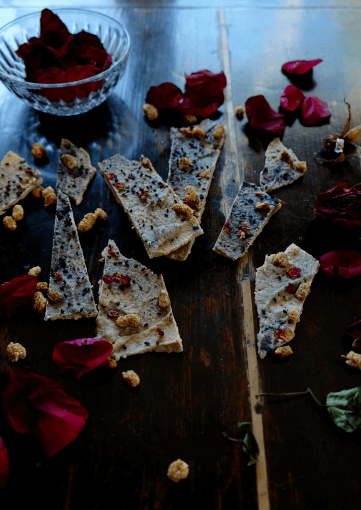 bark with bite: raw floral infused white chocolate charcoal bark